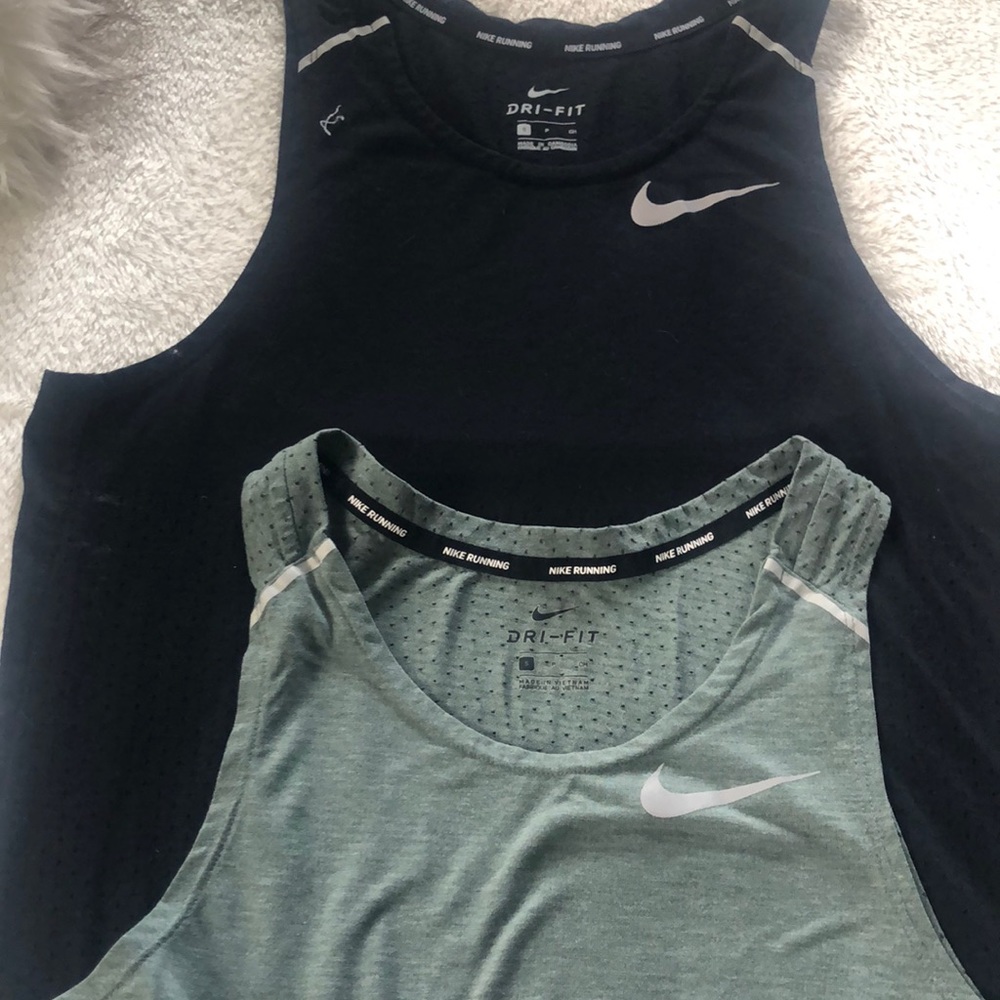 Two MENS Nike tank tops. Super nice!  Size small.